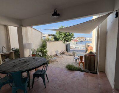2 pièces en rez-de-jardin avec extérieur et vue port (4P)